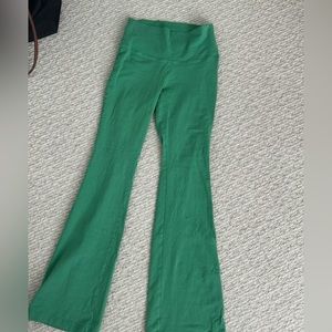 Green Aritzia flare leggings